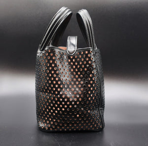 6.	Azzedine Alaïa Laser-cut Mini Leather Bag