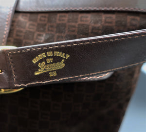 2.	Gucci GG Suede Monogram Bag