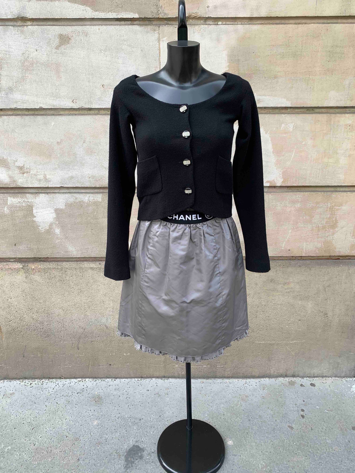 black cropped chanel jacket in black with rhinestones buttons good condition