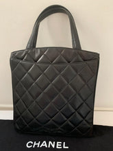 Load image into Gallery viewer, Vintage Chanel quilted tote bag black with gold metal hardware , very good condition
